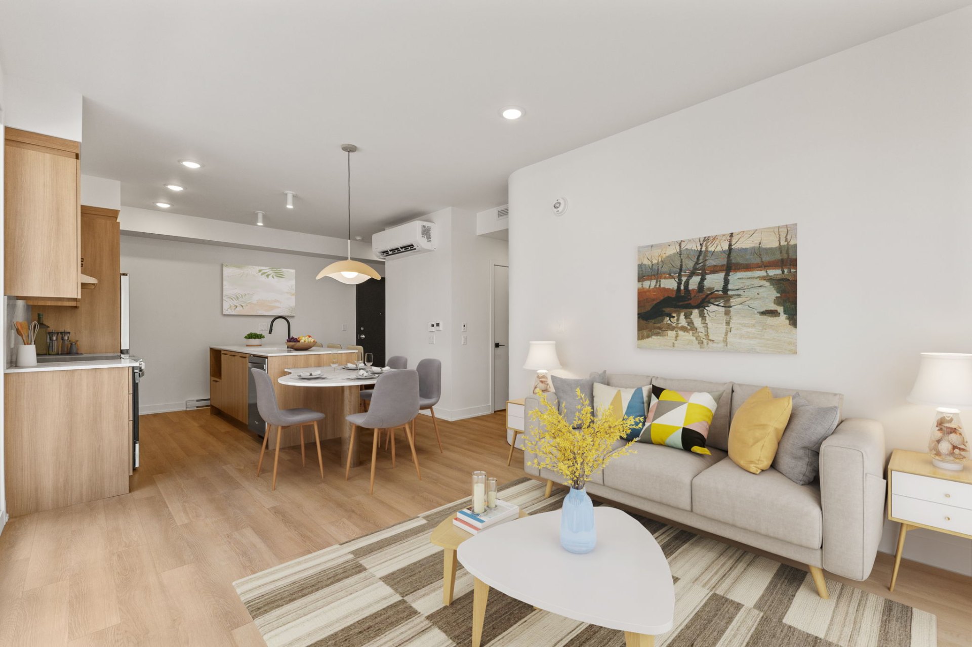 Salon lumineux ouvert sur la cuisine